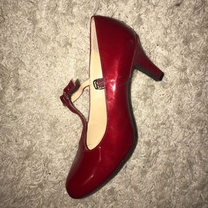 Red pumps with straps size 9M US